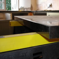 fitting granite worktop in kitchen